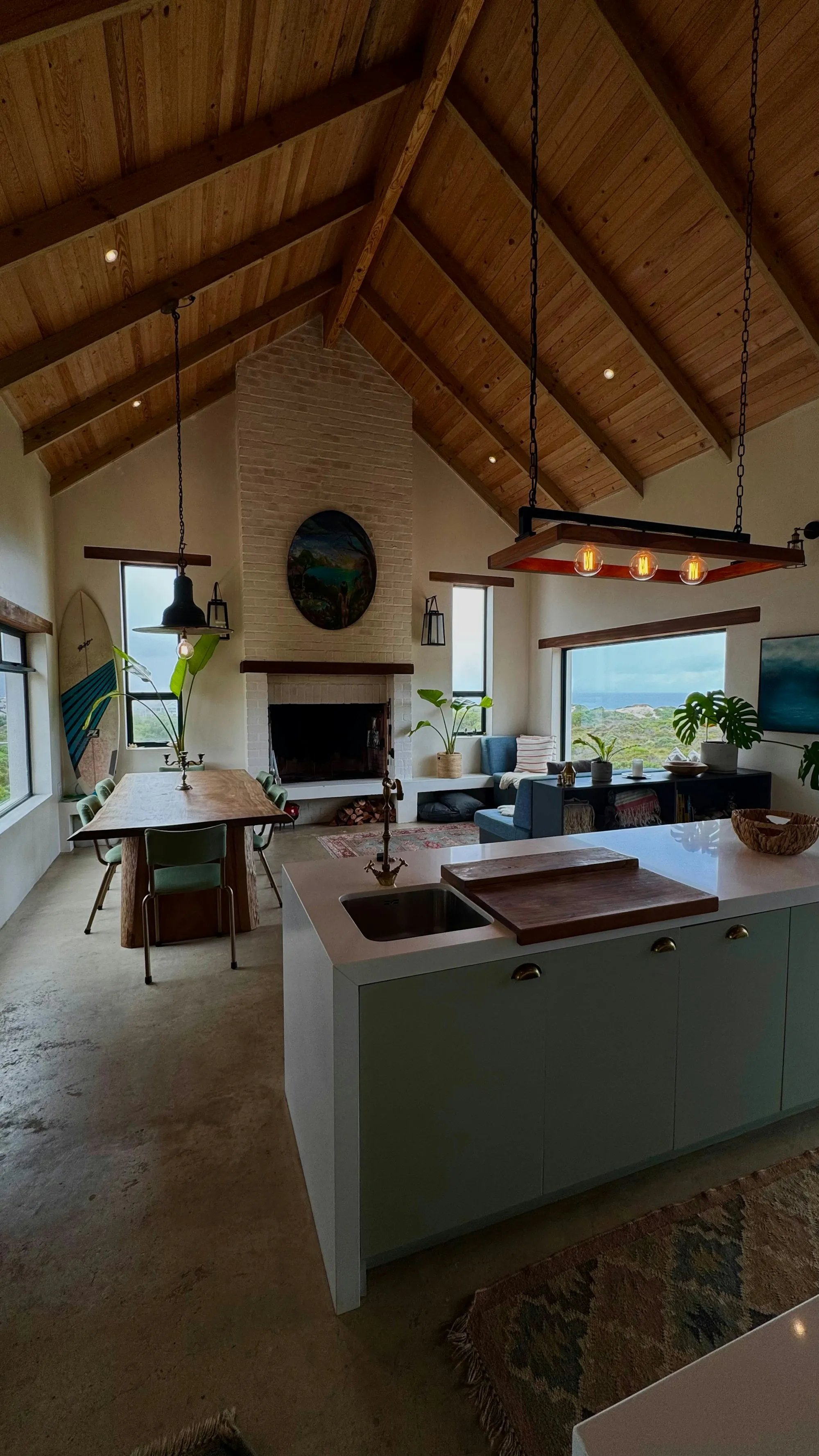 Recessed ceiling lights illuminating a renovated kitchen