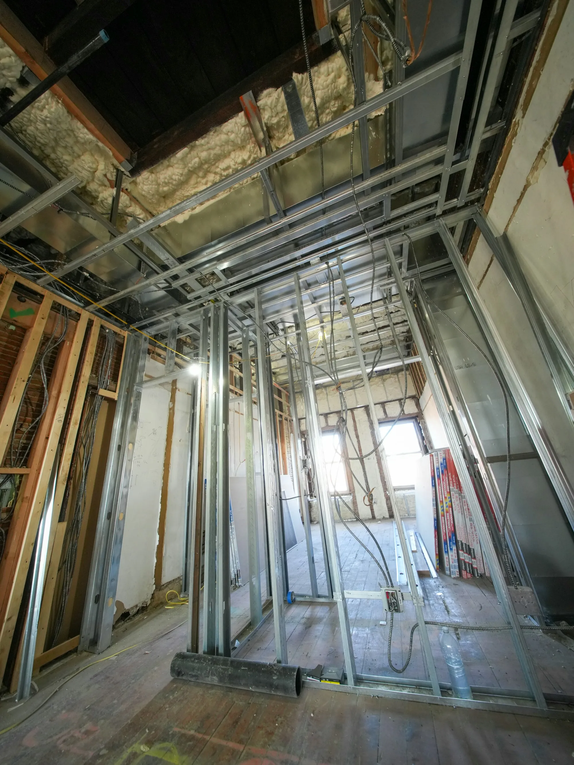 New copper cable runs pulled through open wall framing