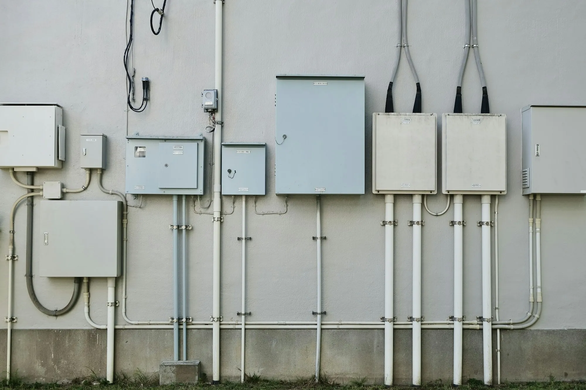 Branch circuit conductors run neatly across a wall
